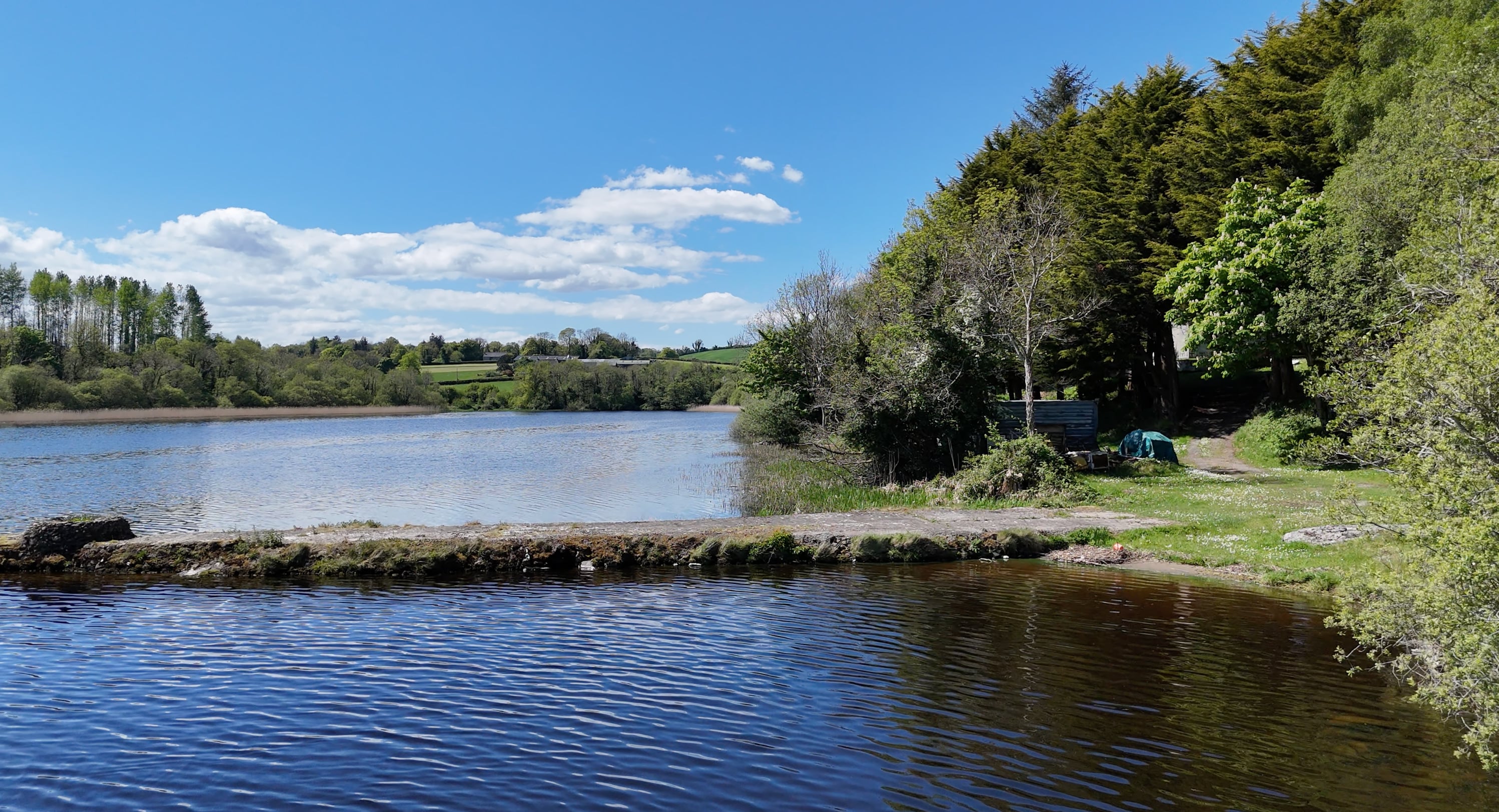 Concrete jetty beside the shoreline with Lower Lough Erne in the foreground